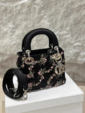 Lady Dior small black silk embroidery bag with silver hardware
